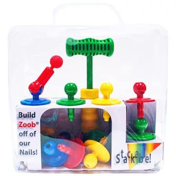 Child playing at the Nilo activity table