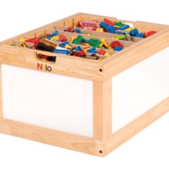 Nilo natural-finish hardwood toy chest with white side panels and divided wooden organizer compartments holding colorful Lego, Duplo, cars, and figures