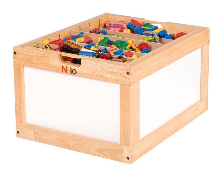 Nilo natural-finish hardwood toy chest with white side panels and divided wooden organizer compartments holding colorful Lego, Duplo, cars, and figures